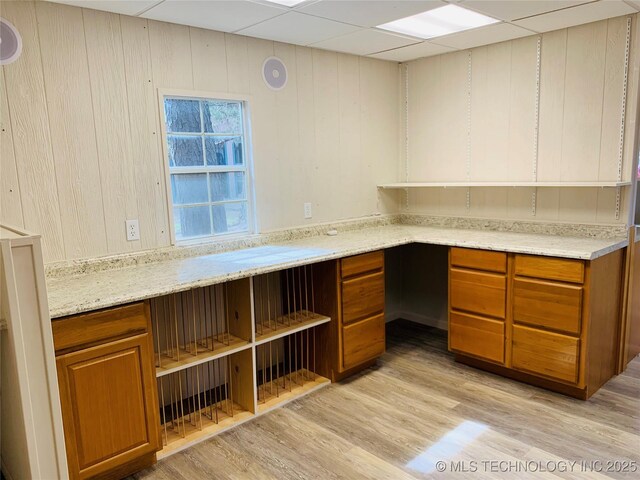 413822 S Sherman, Moyers, OK 74557 - unfurnished office featuring built in desk, light wood-style flooring, and a paneled ceiling