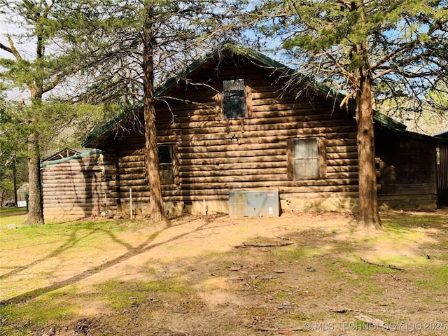 413822 S Sherman, Moyers, OK 74557 - view of property exterior featuring log exterior