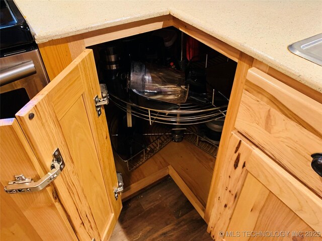 413822 S Sherman, Moyers, OK 74557 - details with stove and dark wood-style floors