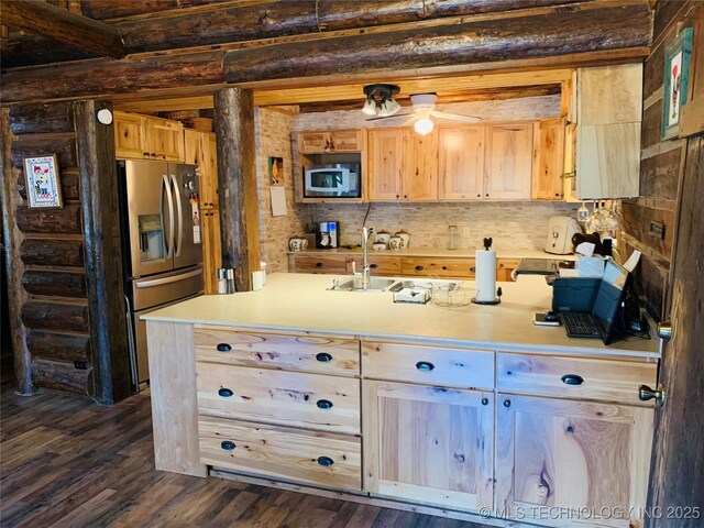 413822 S Sherman, Moyers, OK 74557 - kitchen with dark wood-style flooring, light countertops, light brown cabinets, stainless steel refrigerator with ice dispenser, and built in microwave