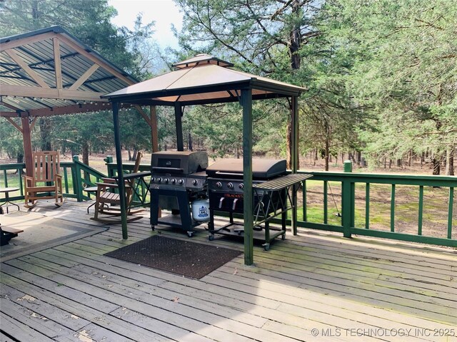 413822 S Sherman, Moyers, OK 74557 - wooden terrace with grilling area and a gazebo