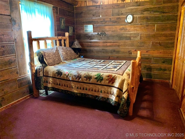 413822 S Sherman, Moyers, OK 74557 - bedroom with carpet flooring and wood walls