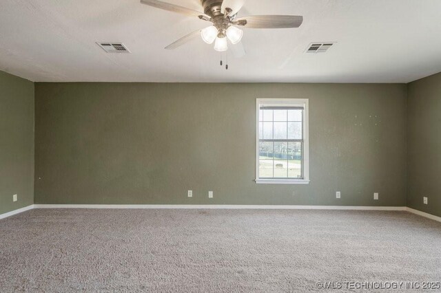 9012 S 49th W Ave, Tulsa, OK 74131 - spare room featuring visible vents, baseboards, and carpet floors