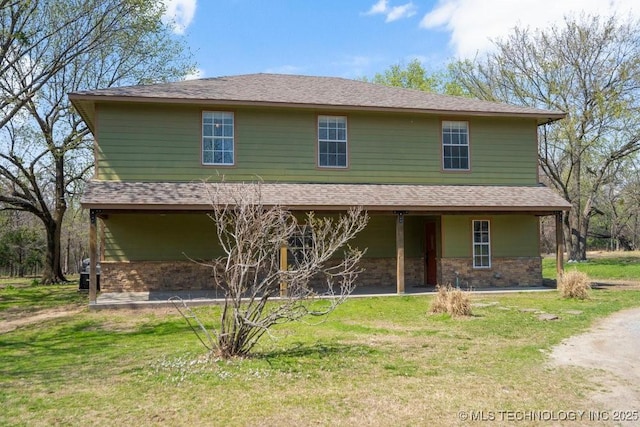 9012 S 49th W Ave, Tulsa, OK 74131 - view of front of house with a front yard and roof with shingles