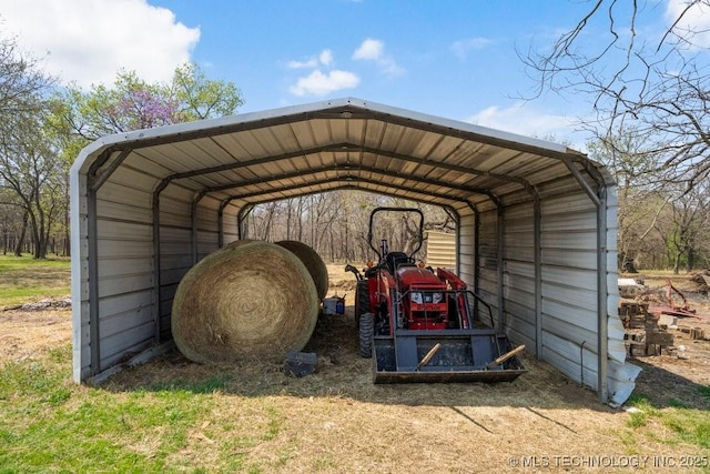 9012 S 49th W Ave, Tulsa, OK 74131 - view of parking / parking lot with a carport