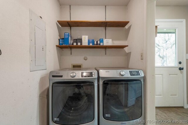 9012 S 49th W Ave, Tulsa, OK 74131 - clothes washing area featuring independent washer and dryer, laundry area, and electric panel
