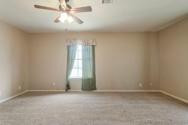 9012 S 49th W Ave, Tulsa, OK 74131 - carpeted spare room featuring ceiling fan and baseboards