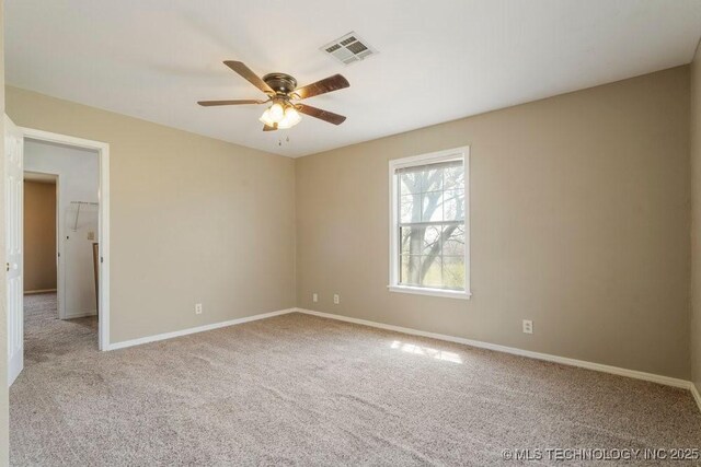 9012 S 49th W Ave, Tulsa, OK 74131 - empty room with carpet flooring, baseboards, a ceiling fan, and visible vents