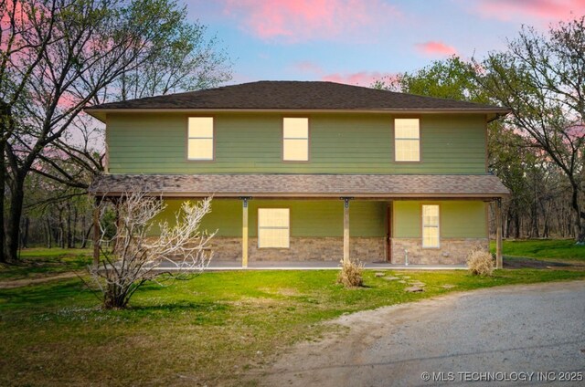 9012 S 49th W Ave, Tulsa, OK 74131 - rear view of property featuring a shingled roof and a lawn