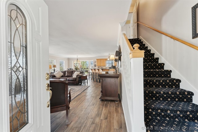 20136 W Chicken Creek Rd, Cookson, OK 74427 - entrance foyer featuring wood finished floors, stairway, and a chandelier