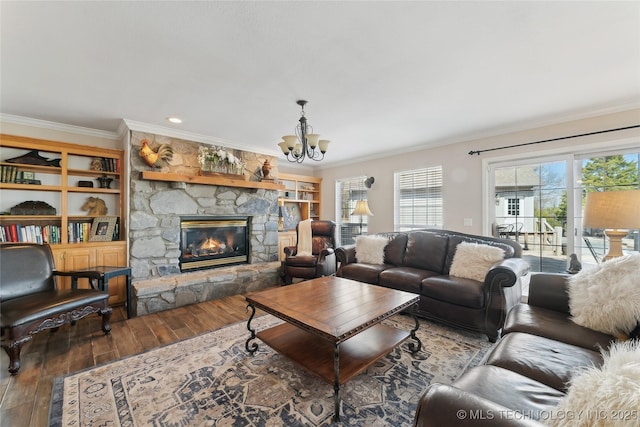 20136 W Chicken Creek Rd, Cookson, OK 74427 - living area with crown molding, hardwood / wood-style flooring, a chandelier, and a stone fireplace