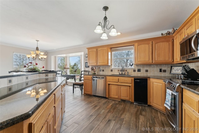 20136 W Chicken Creek Rd, Cookson, OK 74427 - kitchen with a chandelier, stainless steel appliances, crown molding, dark countertops, and tasteful backsplash