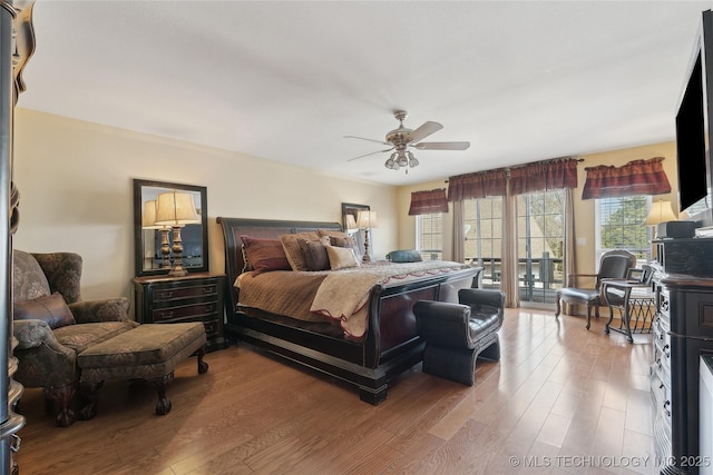 20136 W Chicken Creek Rd, Cookson, OK 74427 - bedroom with access to outside, wood finished floors, and ceiling fan