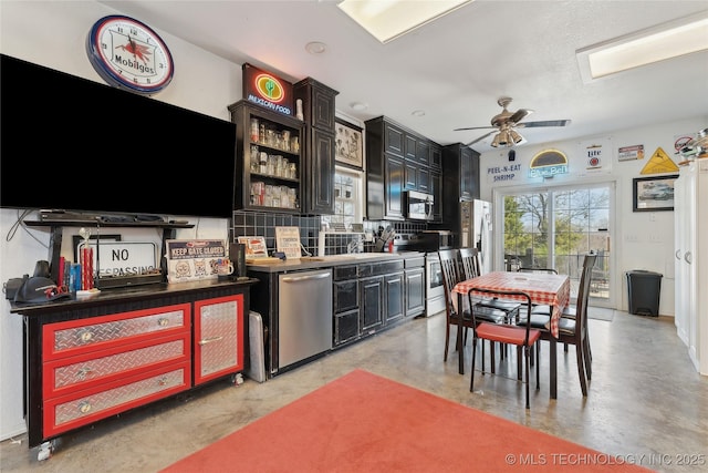 20136 W Chicken Creek Rd, Cookson, OK 74427 - kitchen with stainless steel appliances, finished concrete floors, a ceiling fan, dark cabinets, and open shelves