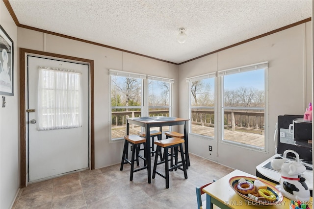 20136 W Chicken Creek Rd, Cookson, OK 74427 - dining space featuring crown molding and a textured ceiling