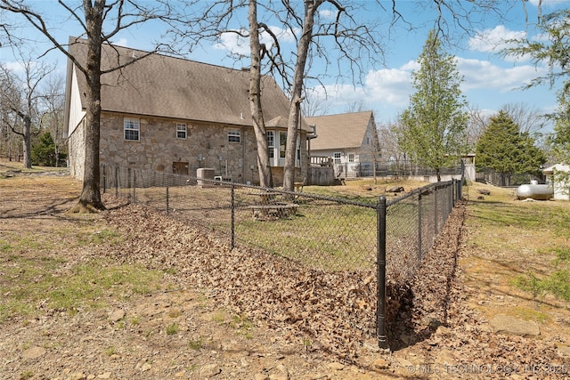 20136 W Chicken Creek Rd, Cookson, OK 74427 - view of home's exterior featuring stone siding and a chimney