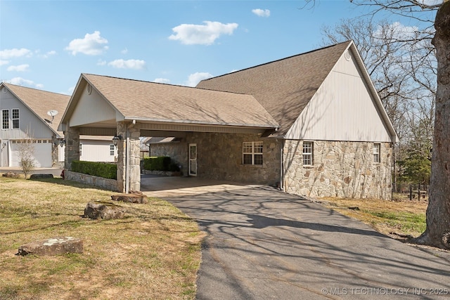 20136 W Chicken Creek Rd, Cookson, OK 74427 - view of home's exterior featuring stone siding, asphalt driveway, a carport, roof with shingles, and a lawn