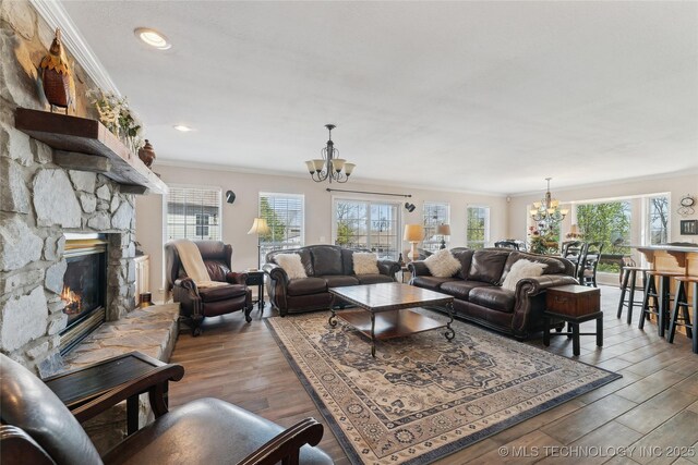 20136 W Chicken Creek Rd, Cookson, OK 74427 - living area featuring a chandelier, plenty of natural light, crown molding, wood finished floors, and recessed lighting