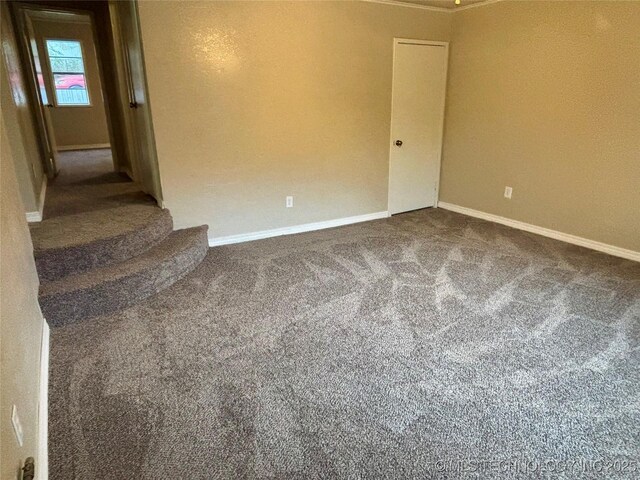 112 S 7th St, Eufaula, OK 74432 - unfurnished room featuring baseboards, carpet floors, and stairs