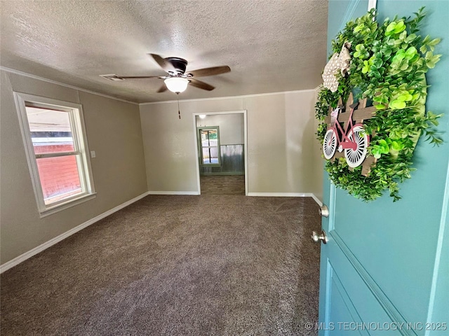 112 S 7th St, Eufaula, OK 74432 - unfurnished room featuring a textured ceiling, plenty of natural light, carpet, ceiling fan, and baseboards