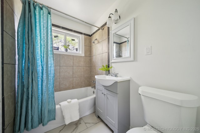 bathroom featuring toilet, shower / tub combo with curtain, marble finish floor, and vanity