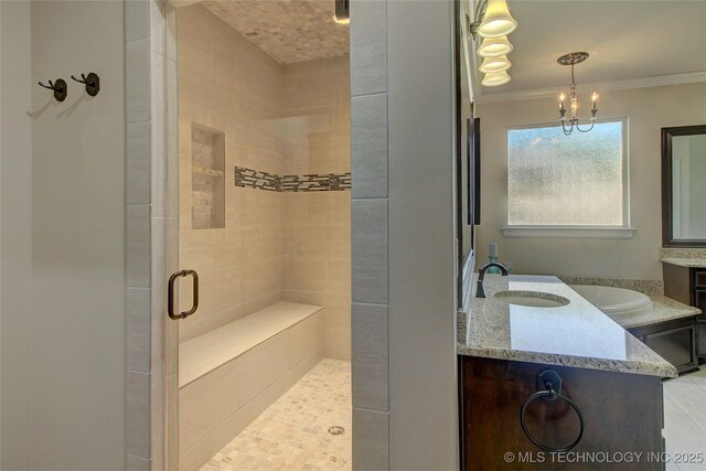 7415 E 109th St S, Tulsa, OK 74133 - bathroom with vanity, ornamental molding, an inviting chandelier, and a shower stall