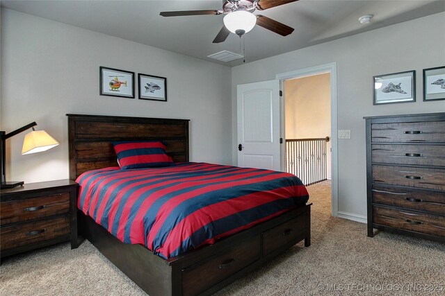 7415 E 109th St S, Tulsa, OK 74133 - bedroom featuring visible vents, ceiling fan, and carpet