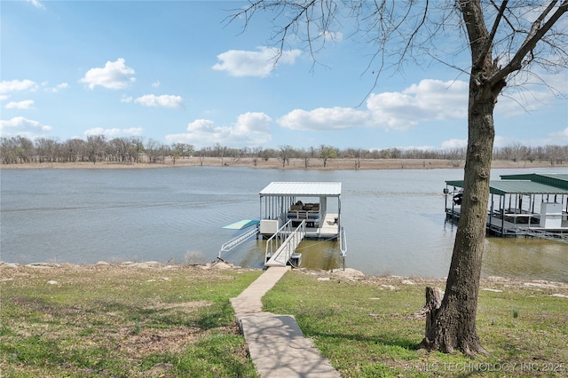 dock area with boat lift and a water view