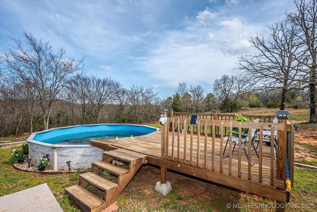 pool featuring a wooden deck