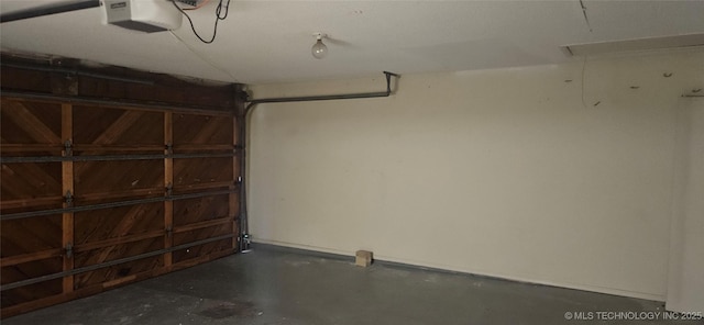 7502 S Winston Pl Unit 203, Tulsa, OK 74136 - garage with a garage door opener