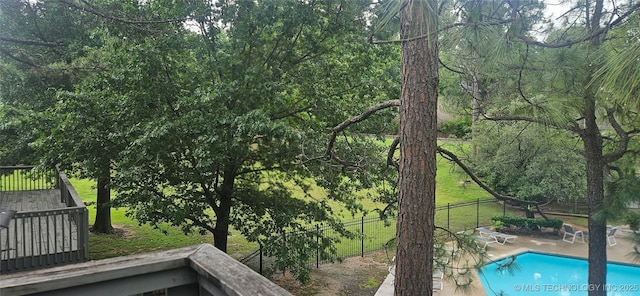 7502 S Winston Pl Unit 203, Tulsa, OK 74136 - view of swimming pool featuring a patio