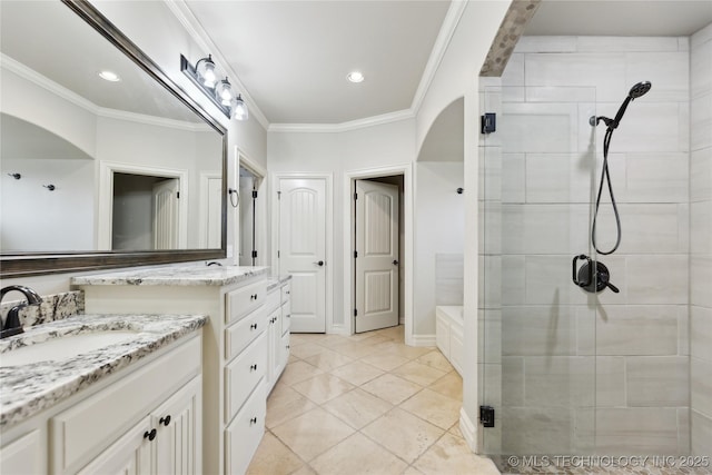 19672 E 69th St N, Owasso, OK 74055 - full bath with tiled shower, two vanities, crown molding, and recessed lighting