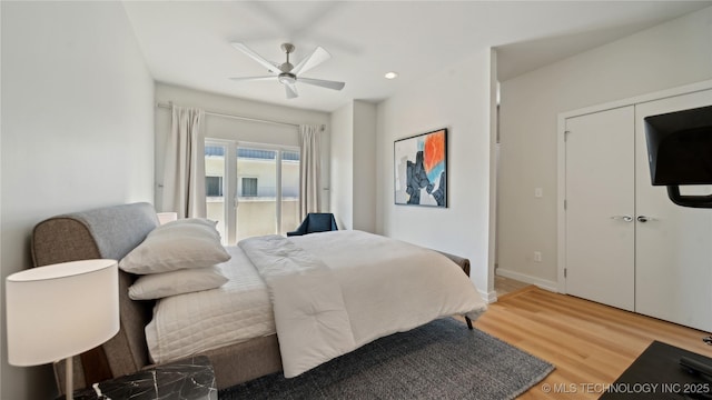 bedroom with recessed lighting, a ceiling fan, baseboards, and light wood-style floors