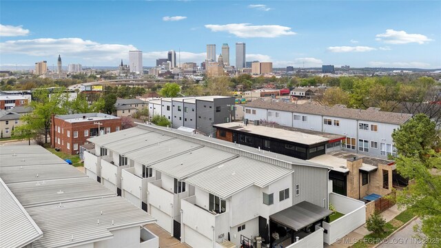 birds eye view of property featuring a view of city