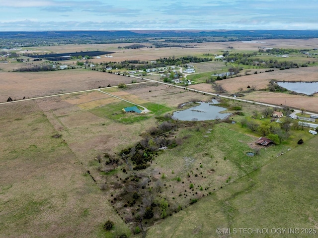 bird's eye view with a water view and a rural view