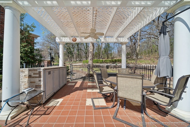 5980 Rolling Oaks, Muskogee, OK 74401 - view of patio / terrace with outdoor dining area and ceiling fan