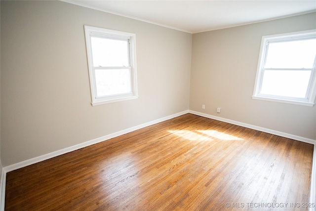 5760 E 29th St, Tulsa, OK 74114 - empty room with a wealth of natural light and baseboards
