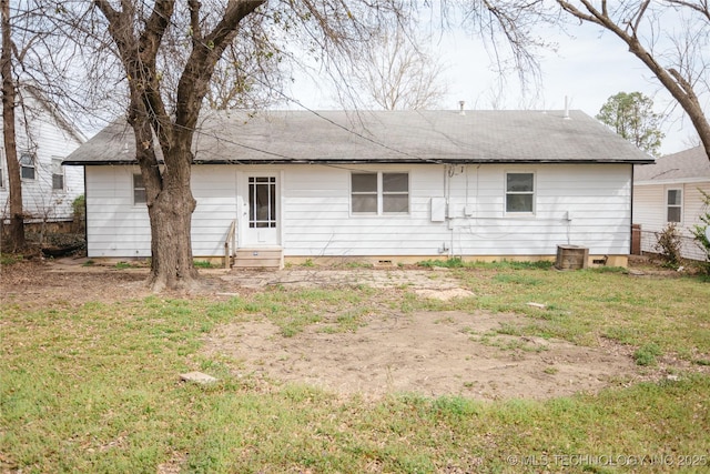 5760 E 29th St, Tulsa, OK 74114 - rear view of house with roof with shingles, entry steps, and a yard