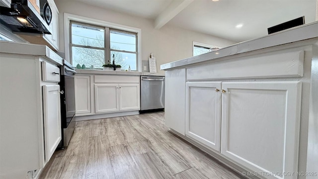 1721 S 114th E Ave, Tulsa, OK 74128 - kitchen featuring white cabinetry, light countertops, light wood-style floors, beamed ceiling, and dishwasher