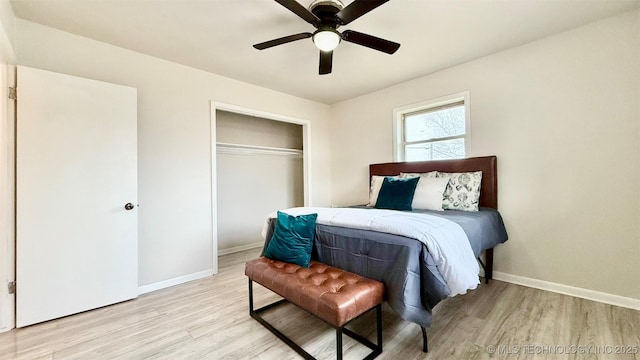 1721 S 114th E Ave, Tulsa, OK 74128 - bedroom featuring a ceiling fan, a closet, baseboards, and light wood-style floors