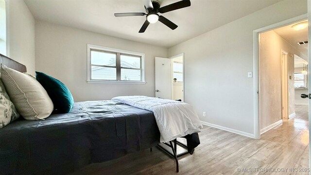 1721 S 114th E Ave, Tulsa, OK 74128 - bedroom featuring baseboards, visible vents, light wood-style flooring, and multiple windows