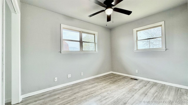 1721 S 114th E Ave, Tulsa, OK 74128 - spare room with baseboards and a wealth of natural light