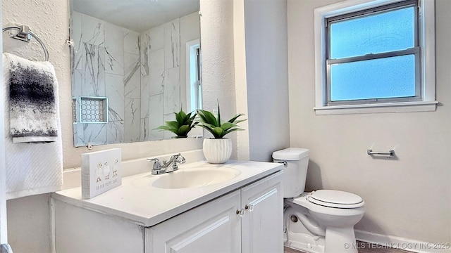 1721 S 114th E Ave, Tulsa, OK 74128 - full bathroom with toilet, vanity, a marble finish shower, and baseboards