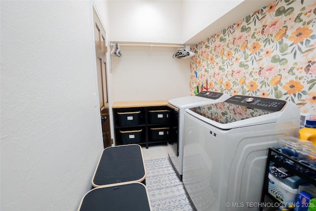 washroom featuring washer and dryer