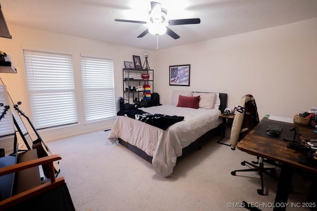 bedroom featuring carpet and a ceiling fan