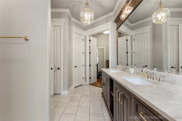 3528 S Wheeling Ave, Tulsa, OK 74105 - bathroom featuring double vanity, a chandelier, marble look tile flooring, and ornamental molding