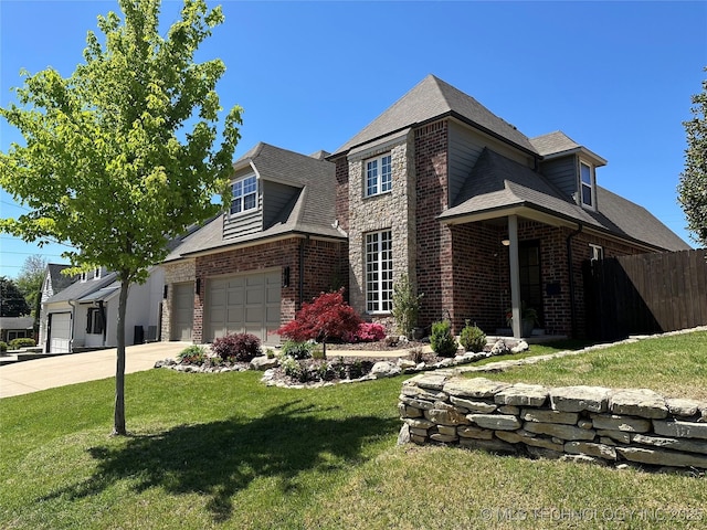 3528 S Wheeling Ave, Tulsa, OK 74105 - view of front facade with brick siding, driveway, roof with shingles, and a garage