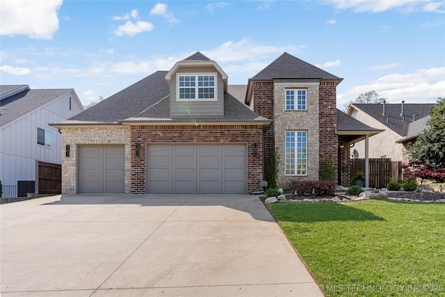 3528 S Wheeling Ave, Tulsa, OK 74105 - view of front of house with a garage, concrete driveway, roof with shingles, brick siding, and stone siding