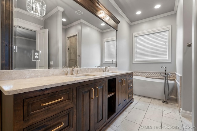 3528 S Wheeling Ave, Tulsa, OK 74105 - bathroom featuring crown molding, a freestanding tub, double vanity, recessed lighting, and a tile shower