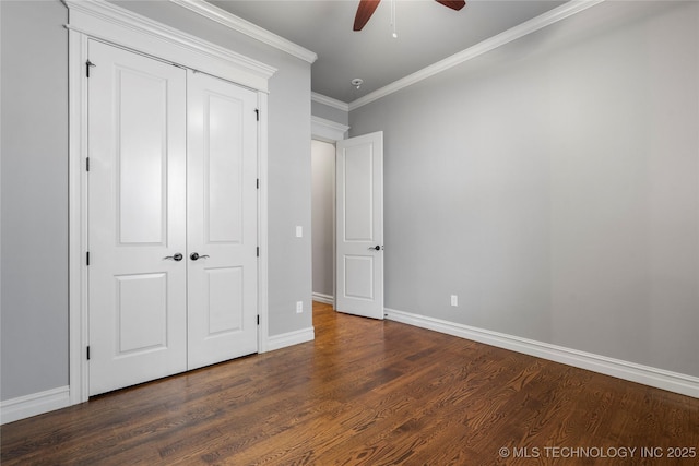 3528 S Wheeling Ave, Tulsa, OK 74105 - unfurnished bedroom with wood finished floors, ornamental molding, a closet, and a ceiling fan
